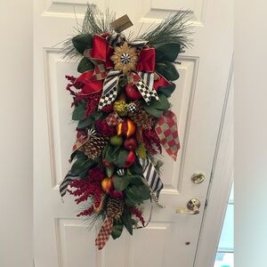 Mackenzie Childs Estate Holiday Decor with Red and Green Accents